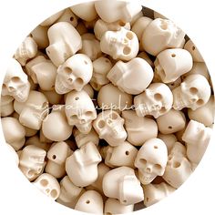 many white skulls are arranged in a circle