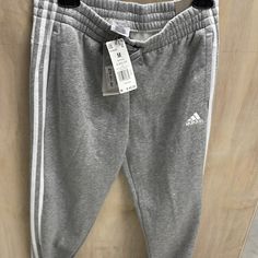 Women Adidas Pans Size M Color Grey Deporte Casual Adidas Joggers For Spring, Casual Three Stripes Joggers For Spring, Casual Three Stripes Sweatpants For Spring, Spring Casual Sweatpants With Three Stripes, Casual Spring Sweatpants With Three Stripes, Spring Cotton Sweatpants With Three Stripes, Cotton Three Stripes Joggers For Spring, Spring Cotton Joggers With Three Stripes, Spring Cotton Three Stripes Joggers