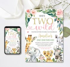 two wild animals birthday party with pink flowers and greenery