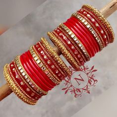 Bollywood Style Red Jewelry With Dori Work, Red Bollywood Jewelry With Dori Work, Traditional Embroidered Bangle For Festive Occasions, Embroidered Jewelry For Wedding And Festivals, Multicolor Dori Work Bangle For Wedding, Red Zari Work Bangle For Diwali, Red Bangle With Zari Work For Diwali, Red Diwali Bangle With Zari Work, Red Kundan Traditional Wear For Wedding