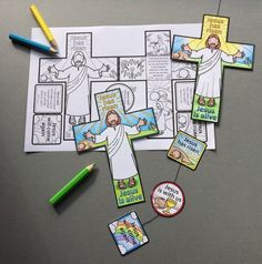 the stations of jesus are laid out on a table with markers and crayons