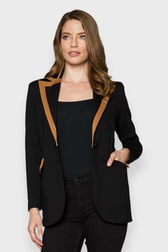 Unleash your inner boss with the Nella Black Tailored Blazer, crafted with precision in Italy from thick and luxurious fabric. Designed with a one-button closure, notched-collar, and flap pockets, this blazer exudes sophistication and style. The floral viscose lining and shoulder pads add a touch of elegance and comfort to your look. With a notched lapel, tan trimming around the collar and pockets, and two flap pockets, this blazer is a must-have for any fashion-forward individual. Elevate your Lapel Blazer, Plus Size Designers, Tailored Blazer, Fitted Blazer, Dress Gift, Like A Boss, Elegant Floral, Notched Collar, Denim Coat