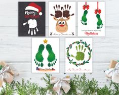 four christmas cards with handprints on them