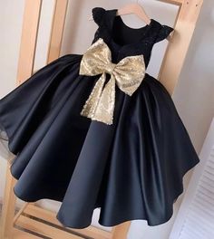 Elegant Black Gown For Pageants, Elegant Black Gown For Pageant, Elegant Black Gown For Fancy Dress, Elegant Black Pageant Gown, Gold Party Dress With Bow, Elegant Gold Princess Dress For Fancy Dress, Elegant Gold Princess Dress For Fancy Dress Occasions, Elegant Gold Dress-up Gown, Kids Flower Girl Dresses