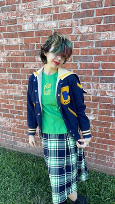 Step back in time with this stylish Vintage Varsity Jacket in vibrant blue and gold. Perfect for showcasing classic school spirit, this retro athletic bomber jacket captures the essence of 1980s sports culture. It's not just a piece of clothing, but a slice of history. - Timeless Style: Features the iconic letterman design with striped ribbing and a snap front closure. - Vibrant Colors: Stand out with the striking blue and gold colorway, perfect for any sporty or casual outfit. - Quality Materia Retro Long Sleeve Varsity Jacket For Campus, Blue Collegiate Track Jacket For College, Blue College Style Outerwear For School, Vintage Green Varsity Jacket For College, Green Vintage Varsity Jacket For College, Retro Cotton Outerwear For School, Retro Blue Varsity Jacket For Fall, Retro Long Sleeve Varsity Jacket For College, Retro Cotton Varsity Jacket For School