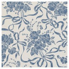 a blue and white floral wallpaper with large flowers on the side, in an ornate pattern