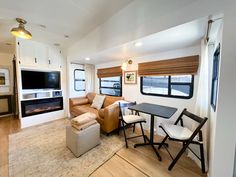 22 Beautiful RV Remodel Ideas | RV Inspiration Rv Roller Shades, Camper Window Coverings Ideas, Rv Blinds Ideas, Camper Shades, Rv Window Treatments Ideas, Rv Window Shades, Camper Blinds, Rv Remodel Ideas, Rv Blinds