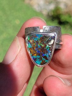 950 Silver ring with a magnificent natural Australian Boulder Opal.  This ring was made by a French designer * Dimensions of the opal: 18 x 15 mm  * Total ring weight: 11.08 g  * Ring size: 56 1/2 (FR) G Ring, Boulder Opal Ring, Australian Boulder Opal, French Designer, Blue Band, Opal Ring, Welo Opal, Opal Pendants, Boulder Opal