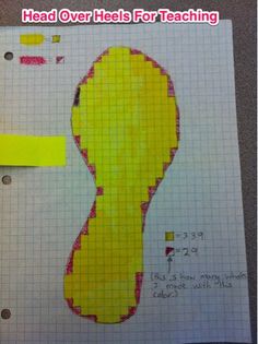 a piece of paper that has been cut out to look like a shoe with yellow tape on it