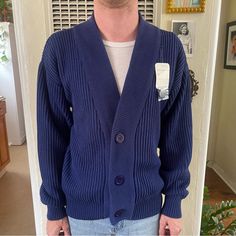 Vintage Deadstock Men’s Early 1980s Neiman Marcus Heavy Knit Ribbed Cotton Navy Blue Cardigan Sweater. Button Front Closure. Original Tags Still Attached! Length 26” Pit To Pit 20.5”. Vintage Blue Button-up Cardigan, Blue Vintage Button-up Cardigan, Blue Vintage Knit Outerwear, Vintage Blue Knit Cardigan, Retro Blue Cardigan With Buttons, Blue Retro Cardigan With Buttons, Vintage Blue Sweater With Button Closure, Blue Vintage Sweater With Button Closure, Blue Retro Sweater With Button Closure