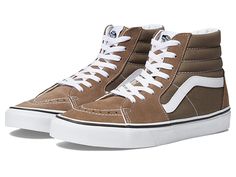 Vans SK8-Hi - Skate Shoes : Color Theory Walnut : Keep it old school every step of the way with the classic Vans SK8-Hi skateboard shoes! High-top skate shoes with a classic silhouette and Sidestrap detail. Uppers of suede, leather, or canvas. Cotton drill lining. Padded collar for added comfort and support. Triple-stitch collar adorns collar. Die-cut EVA insert. Vulcanized construction: &amp,#8226, Slimmed-down profile offers a flexible feel. &amp,#8226, Gum rubber outsole with signature waffle Mens High Top Vans, Vans High Top, Classic Vans, Sk8 Hi, Vans High Top Sneaker, Vans Sk8, How To Slim Down, Swag Shoes, Skate Shoes