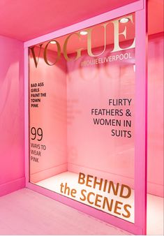 a pink display case with the words,'behind the scenes '