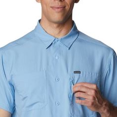 The Columbia Silver Ridge Utility Lite Short-Sleeve Shirt takes a timeless button-up shirt and packs it full of features that encourage us to go on adventures. The recycled synthetic fabric found on this shirt wicks moisture, fights odors, and blocks out the sun so that we can stay focused. Solid Color Button-up Shirt For Outdoor, Solid Color Button-up Outdoor Shirt, Solid Button-up Outdoor Shirt, Outdoor Button-up Camp Shirt With Pockets, Outdoor Short Sleeve Shirt With Pockets, Solid Color Short Sleeve Shirt With Pockets For Outdoors, Solid Short Sleeve Shirt With Pockets For Outdoor, Button-up Tops With Pockets For Outdoor Activities, Solid Camp Shirt With Pockets For Outdoor