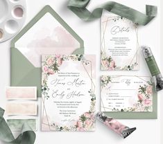 wedding stationery with flowers and greenery on the front, along with matching envelopes