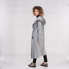 Hooded Cloak, Knitted Cardigan, Oversized HoodieThis extravagant and chic long knitted cardigan has two side pockets and comfortable hood.The model in the picture is 168cm. ⅼ 5.6 ft. tall and is wearing size S / color: gray🌟 INFO:• Worldwide EXPRESS shipping – please provide a phone number for shipping documents• US Sizing XS to 4XL – body size chart available below• We offer customization to Personal Measurements & Larger Sizes 5XL, 6XL, 7XL ….🌟 MATERIAL & CARE• fabric: wool, elastane Gray Hooded Cardigan For Spring, Hooded Cardigan For Spring Loungewear, Spring Hooded Loungewear Cardigan, Oversized Hooded Cardigan For Layering, Cyberpunk Cloak, Womens Cape Coat, Long Hooded Cloak, Tricotin Long, Cloak With Hood