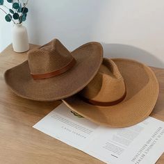 Discover the Perfect Blend of Style and Functionality Step out in style this summer with our New Design Natural Paper Western Cowboy Hat. Whether you're heading to the beach, a music festival, or just enjoying a sunny day outdoors, this hat is your ultimate accessory. Crafted with a blend of natural paper and polyester, it offers a lightweight and breathable fit, making it ideal for warm weather. Versatile and Unisex This cowboy hat is designed for both men and women, offering a unisex appeal that fits seamlessly into any wardrobe. Its solid pattern and casual style make it a versatile piece that complements any outfit, whether you're going for a laid-back beach look or a more polished summer ensemble. Key Features Material: Natural paper and polyester for a lightweight, breathable feel. B Adjustable Summer Boater Hat For Outdoor, Short Brim Festival Hat With Uv Protection, Festival Hat With Uv Protection And Short Brim, Adjustable Boater Hat For Summer Outdoors, Short Brim Hat With Uv Protection For Festivals, Adjustable Boater Hat For Outdoor Summer Use, Brown Fedora With Upf 50+ For Summer, Adjustable Flat Brim Bucket Hat For Beach Season, Brown Hats With Uv Protection For Summer