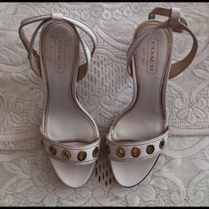 Final Priceno Offers Acceptednew Authentic Coach White Sandals Heels. These Buckle Up Around Your Ankle. Paid $284 Including Tax. Never Worn. Heel Height Is Approx 4 Inches. Platform Is Approx 1/2-3/4 Inches Luxury Coach Sandals For Spring, Luxury Coach Sandals With Round Toe, Coach Luxury Open Toe Sandals, Luxury Open Toe Coach Sandals, Chic Coach Sandals With Heel Strap, Luxury High Heel Coach Heels, Elegant Coach Sandals For Spring, Luxury Coach High Heels, Designer Coach Heels For Evening