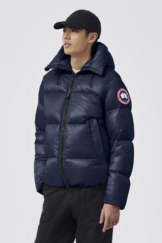 The Crofton Puffer is made with Recycled Feather-Light-Ripstop fabric—an ultra-lightweight fabric with ripstop construction and a water repellent finish. An all-season essential, this puffer jacket is packable and easy to stash away on the go. Luxury Classic Men's Puffer Jacket, Luxury Long Sleeve Men's Puffer Jacket, Mens Canada Goose Jackets, Luxury Blue Men's Puffer Jacket, Men Parka, Nylon Puffer Jacket With Double-lined Hood For Outdoor, Mens Parka, Baby Outerwear, Ripstop Fabric