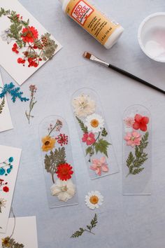 flower bookmarks with the words how to make pressed flower bookmarks on them next to flowers