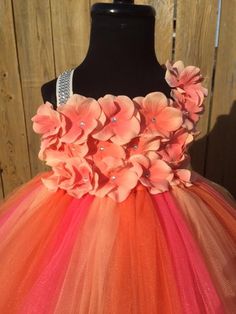 FREE SHIPPING on all orders within the US, no coupon code needed! Coral and Orange Hydrangea Tutu Dress by Little Ladybug Tutus. Handmade Tutus for girls specializing in birthday party dresses, Halloween costumes, flower girl dresses, pageant tutus, 1st birthday tutus, and blinged Converse sneakers. We accept custom orders! ORDER PRODUCTION TIME Please check the header on our website for current turn around time. Since all items are handmade at the time of purchase, there is a production time th Coral Flower Girl Dresses, Ladybug Tutu, Tutu Dress Costumes, Baby Tutu Dresses, Birthday Party Dresses, 1st Birthday Tutu, Handmade Tutu, Dresses Pageant, Coral Flower