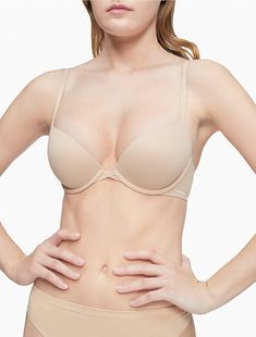 The perfectly fit push-up bra features 4-way stretch foam cups for extra lift.  Material: 72% Nylon, 28% Elastane. Fitted Seamless Calvin Klein Bra, Calvin Klein Fitted Seamless Bra, Calvin Klein Seamless Fitted Bra, Calvin Klein Seamless Bra, Classic Underwire Bra With Soft Touch, Elegant Calvin Klein Bra With Built-in Support, Elegant Calvin Klein Underwire Bra, Calvin Klein Elegant Underwire Bra, Calvin Klein Underwire Bra With Padded Cups