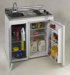 an open refrigerator with the door wide open