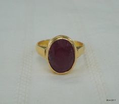 Vintage 18kt gold ring from Rajasthan India. Beautiful design seted ruby gemstone. Nice handmade molded ring made of 18kt solid yellow gold, Good for your jewellery collection.Usa ring size - 7.75 (we can adjust the size)width of top - 14 mmweight - 6.2 gramsmaterial - 18kt solid yellow gold. Gold Ruby Signet Ring For Formal Occasions, Gold Ruby Ring For Formal Events, Formal Ruby Ring In Yellow Gold, Hallmarked 22k Gold Ruby Ring For Anniversary, 22k Gold Hallmarked Ruby Ring For Anniversary, Ruby Birthstone Ring In Yellow Gold, Oval Ruby Ring In Gold, Oval Ruby Rings In Gold, Yellow Gold Ruby Signet Ring As Gift