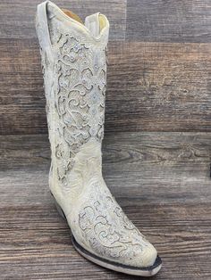 SKT: A3322 White Glitter Inlay and Crystals - Made with an original cowhide leather overlaying an iridescent glitter. This boot is finished with crystal accents making it perfect for your big day or any special event where you want to shine. Handcrafted by more than 90 artisans who guarantee its prolonged useful life. Ethical Factories. Authentic vaquero style. Hand-lasted, Hand-cut, Hand-finished. MATERIAL TOE TYPE SHAFT HEIGHT COWHIDE SNIP TOE 13" HEEL HEIGHT CONSTRUCTION SOLE MATERIAL 2" GOOD Country Concert, Cute Boots, Western Boot, Goodyear Welt, White Glitter, To Shine, Western Boots, Cowhide Leather, Special Event