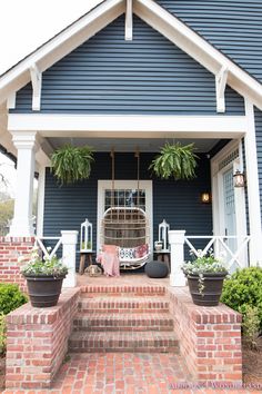 a house with blue siding and white trim