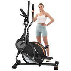 a woman standing next to an exercise bike