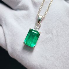 Stone : lab grown emerald Stone shape : Octagon Stone color : green Stone size : 14x10 mm Side stone: non Chain claps type : Springring Metal Plating : Silver, ( if you want Rose gold or Yellow Gold Plating message me) Chain A type : Wheat Chain (2 mm) Chain B type : Rolo chain (2.5 mm) Chain C type : Cable Chain (2.4 mm) Chain D Figure Eight : (3 mm) Chain E Figaro : (3 mm) Chain length : 16 Inch, 18 Inch, 20 inch, 22 inch If You Have Any Questions, Please Feel Free Contact Us through Etsy Message Service  If you want to make jewelry of some other design or other types please contact us  => Payment Policy We accept payment through PayPal. All payments must be made within 4 days of purchase. For shipping charges and combine shipping charges please see Shipping & Payments tab above. Please Green Diamond Cut Emerald Pendant Necklace, Emerald Rectangular Pendant Jewelry For May Birthstone, Green Pendant Necklaces With Prong Setting, Green Pendant Necklace With Prong Setting, Green Octagon Birthstone Jewelry, Fine Jewelry Emerald Rectangular Pendant, Sterling Silver Diamond Cut Emerald Pendant Necklace, Silver Emerald Rectangular Pendant Jewelry, Silver Sterling Silver Emerald-cut Emerald Necklace