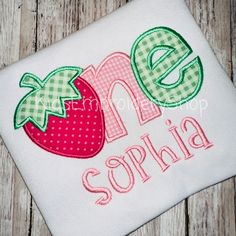 this is an applique shirt with the word one and two strawberries