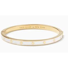 Kate Spade- Gold/White Bracelet Nwt ***Brand New*** Plated Metal Gold Polished Finish Enamel Weight: 23.7 G Hinge Closure Length: 2.25" Width: 2.13" Dust Bag Included B34 Sku: 1072 Kate Spade Bow Bracelet, Gold Knot Bracelet, Rose Gold Bangle Bracelet, Kate Spade Heart, Kate Spade Studs, Kate Spade Bracelet, Kate Spade Bangle, Kate Spade Watch, Lucite Bracelets