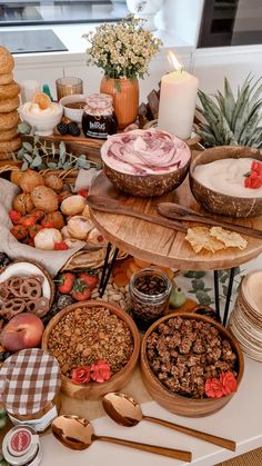 an assortment of food is displayed on a table