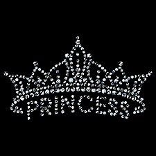 a tiara with lots of small white dots on the top and bottom, in front of a black background