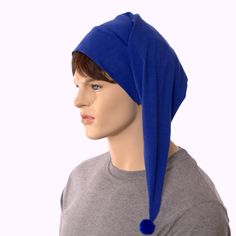 Royal blue nightcap made of cotton. Fabric is 96% cotton. Traditional Poor Poet style with pointed tip. Small blue pompom on end. Double thick headband. One size fits most adults with heads measuring 22-24 inches. Ready to Ship. Blue Hat With Cotton Sweatband, Blue Hat With Cotton Sweatband, One Size Fits Most, Thick Headband, Sleeping Hat, Thick Headbands, Elf Hat, Hat Women, Night Cap, Fabric Bolts