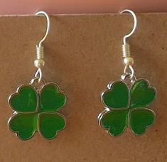 Very nice pair of 4 leaf clover. Perfect for St Patrick's Day or anything you need some good luck. St. Patrick’s Day, Clover Green, Clover Earrings, Saint Patrick, Clover Leaf, St Patrick, St Patricks Day, Jewelry Earrings Dangle, Dangle Drop Earrings