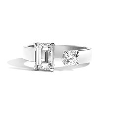 Modernize your romantic expression with this on-trend Shahla lab-created diamond toi et moi engagement ring. Platinum A 1-1/2 ct. emerald-cut lab-created diamond punctuates one side of the open band The other side features a 1/5 ct. round lab-created diamond Certified lab-created diamonds with F color/VS2 clarity and certification card 1-5/8 cts. t.w. of lab-created diamonds Fits true to size Each item is custom made and not eligible for returns Emerald Wedding Rings Platinum, Shahla Karimi, Primary Shapes, Gap Band, Diamond Picture, Band Metal, Emerald Cut Diamonds, Emerald Diamond, Wide Bands