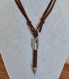 Here is one Genuine leather necklace . Versatile - from choker to long necklace. Length of the necklace is adjustable from: 14 inch/ 40 cm to 28 inch / 72 cm Free gift box: You will receive this necklace in a beautiful gift box with cushion inside! Let me pleasantly surprise your loved ones on your behalf if it's a gift! If you need a special handmade jewelry - something unique or just have a question/comment just contact me via Etsy message. Love, Maria Brown Leather Jewelry For Father's Day, Brown Waxed Cord Necklace For Gift, Brown Leather Necklace With Adjustable Length, Brown Necklace With Sliding Knot For Gift, Masculine Brown Jewelry For Gift, Masculine Brown Jewelry Gift, Father's Day Brown Leather Jewelry, Masculine Leather Strap Jewelry Gift, Leather Necklace With Adjustable Length For Gift