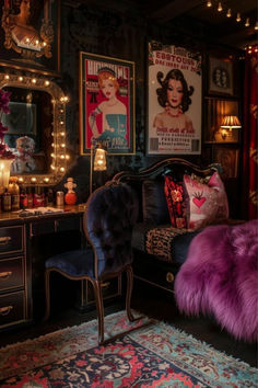 a bedroom decorated in black and purple with pictures on the wall, vanity mirror, chair, lights, and rug