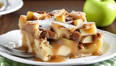 a slice of apple pie on a white plate