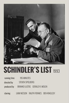 an old photo of two men looking at something on a table with the caption schndler's list 1933