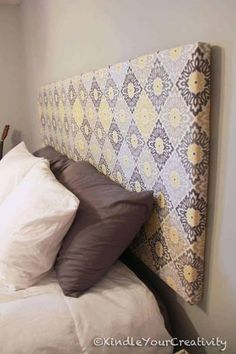 the headboard is made up to look like a quilt