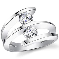 two white gold rings with diamonds on them