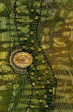 an abstract painting with circles and dots on the surface, in shades of olive green