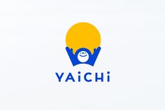 the logo for yaichi is blue and yellow with an orange ball on it