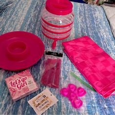 the items needed for making a craft project are laid out on a blue and white tablecloth