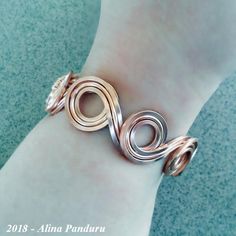 Copper Bracelet 'Round and Round' Handmade OOAK Wire | Etsy Handmade Spiral Metal Bracelet, Handmade Flexible Bracelet, Handmade Adjustable Spiral Cuff Bracelet, Handmade Flexible Jewelry For Gifts, Bohemian Flexible Bracelet Jewelry, Adjustable Spiral Wire Wrapped Bracelets, Handmade Spiral Bangle As Gift, Handmade Spiral Bangle Gift, Bohemian Spiral Bracelet As A Gift