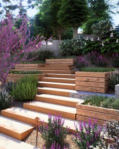 a garden with wooden steps leading up to purple flowers