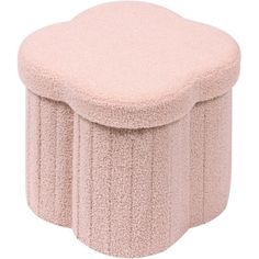 a small stool made out of pink sheepskin